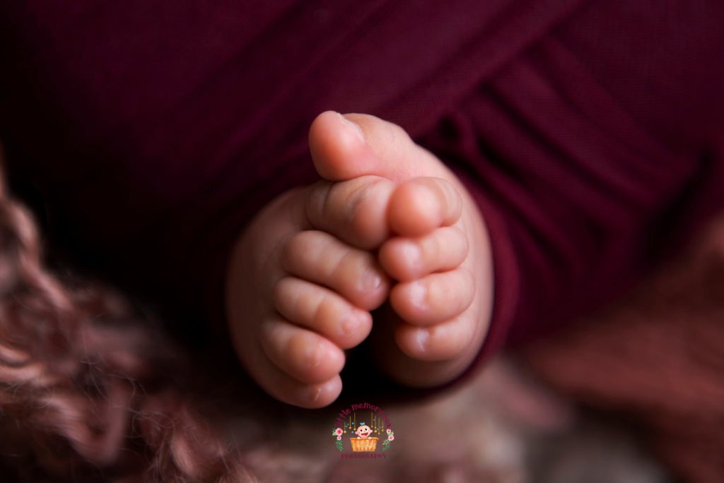 newborn baby feet wrapped